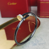 Side view of Cartier unisex jewelry piece