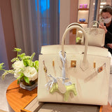  Refined tote bag carried on shoulder