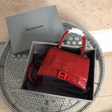 Front view of premium polished women's handbag – women's luxury accessory