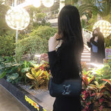  Statement carryall bag carried on shoulder