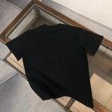 Close-up detail shot of Givenchy luxury clothing with relaxed-fit cut
