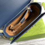 Close-up detail of refined polished women's handbag – women's luxury accessory