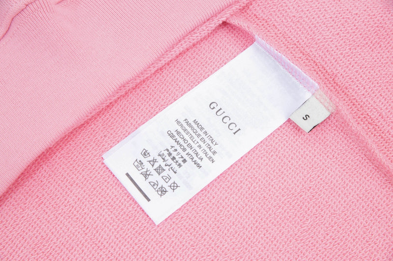 Close-up detail shot of Gucci luxury clothing with streetwear-inspired cut