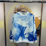Back view of Louis Vuitton luxury clothing with signature branding