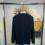 Side profile of Louis Vuitton luxury clothing with monogram-inspired silhouette