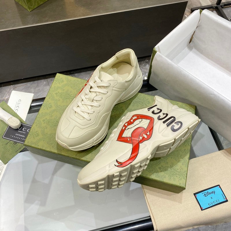 Gucci crisp white luxury sneakers view 4 retro runner design