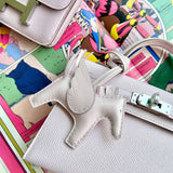  Curated crossbody bag carried on shoulder