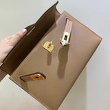 Side view of streamlined structured handbag
