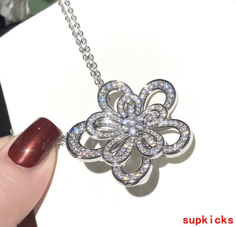 Lifestyle view of Van Cleef & Arpels unisex jewelry piece