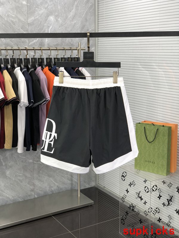 Side profile of Rhude luxury clothing with label-forward styling
