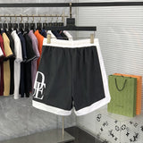 Side profile of Rhude luxury clothing with label-forward styling