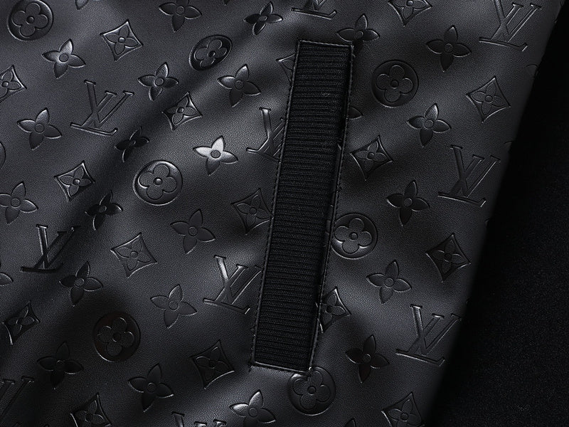 Side profile of Louis Vuitton luxury clothing with signature branding