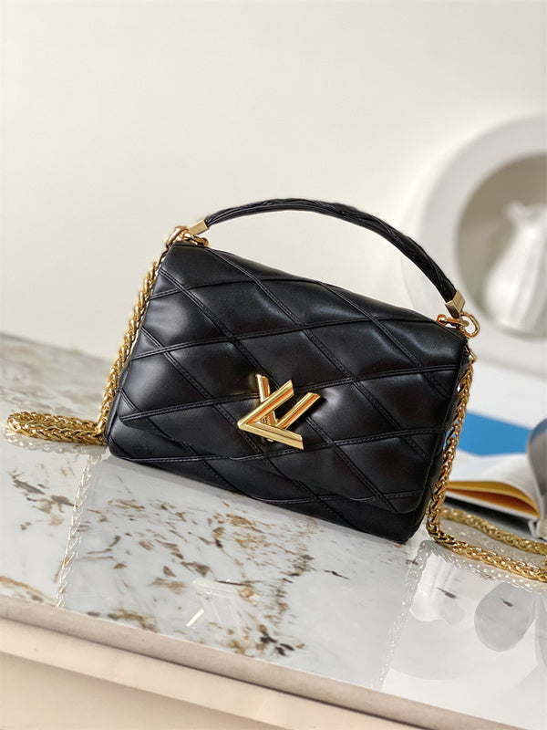  Curated handbag carried on shoulder