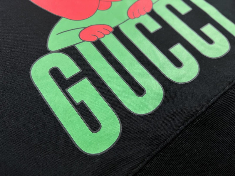 Front view of Gucci luxury clothing with signature branding