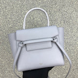 Side profile of signature statement women's handbag – women's everyday handbag