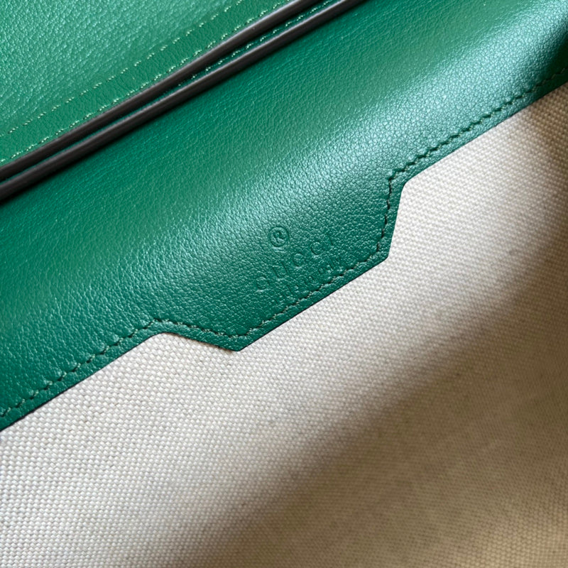 Side profile of polished elevated women's handbag – women's luxury handbag