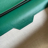 Side profile of polished elevated women's handbag – women's luxury handbag