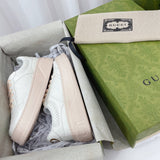 Side profile of Gucci fresh white-and-black sneakers sleek tonal finish