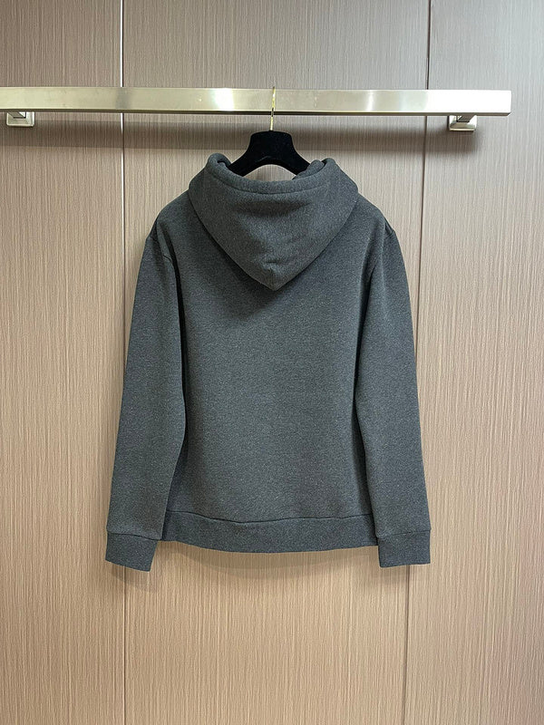 Side profile of Louis Vuitton luxury clothing with signature branding