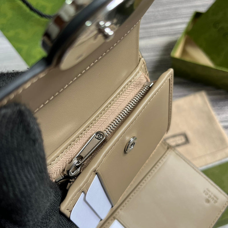 Side profile of modern signature women's handbag – women's statement bag