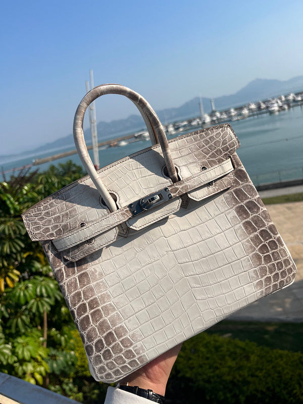 Side view of modern structured handbag