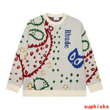 Back view of Rhude luxury clothing with monogram-inspired silhouette
