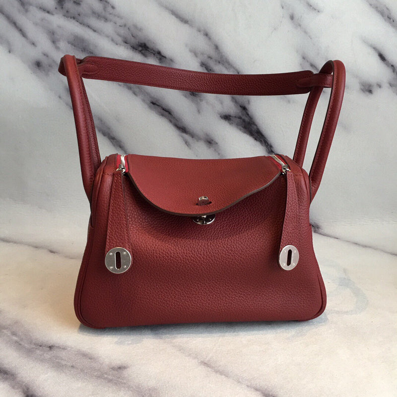 Side view of graceful structured handbag