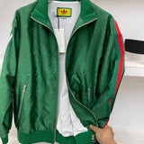 Front view of Gucci luxury clothing with label-forward styling