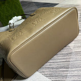 Styled lifestyle shot of signature elevated women's handbag – women's statement bag