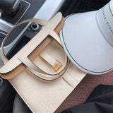  Streamlined shopper bag carried on shoulder