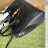 Handle and strap detail of elevated classic women's handbag – women's designer-style accessory