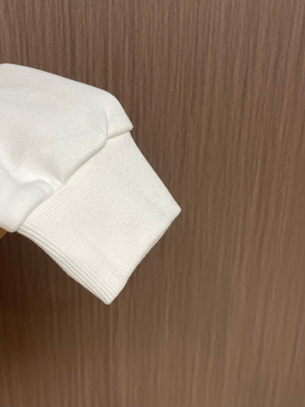 Back view of Louis Vuitton luxury clothing with relaxed-fit cut