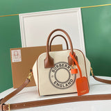 Ziva's Charm handbag – side angle view (one versatile size)