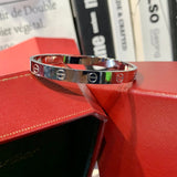 Angled view of Cartier unisex jewelry piece