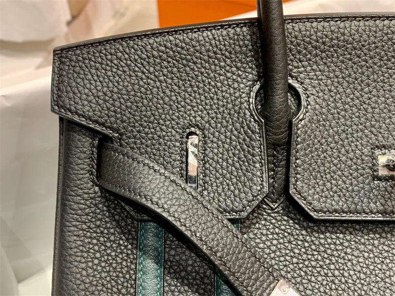 Side view of structured structured handbag