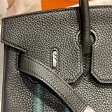 Side view of structured structured handbag