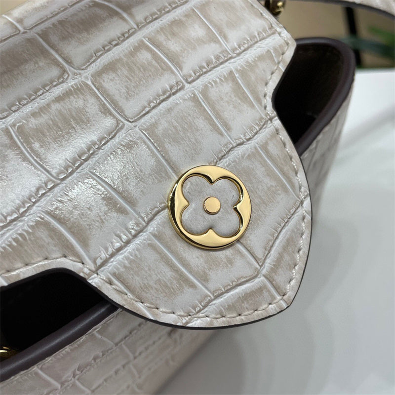  crossbody bag close-up of hardware and finish