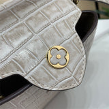  crossbody bag close-up of hardware and finish
