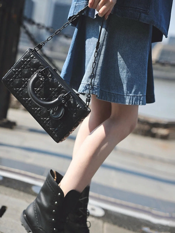 Styled lifestyle shot of elevated modern women's handbag – women's luxury accessory