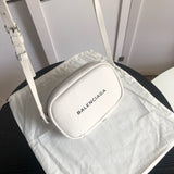 Handle and strap detail of refined elevated women's handbag – women's statement bag