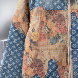 Flat lay presentation of Louis Vuitton luxury clothing with logo-detail design