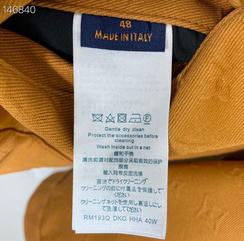 Side profile of Louis Vuitton luxury clothing with tailored silhouette