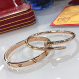 Side view of Cartier unisex jewelry piece