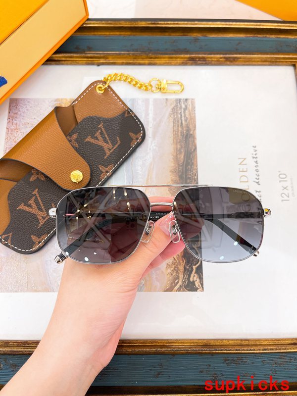 Close-up detail view of Louis Vuitton unisex sunglasses