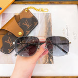 Close-up detail view of Louis Vuitton unisex sunglasses
