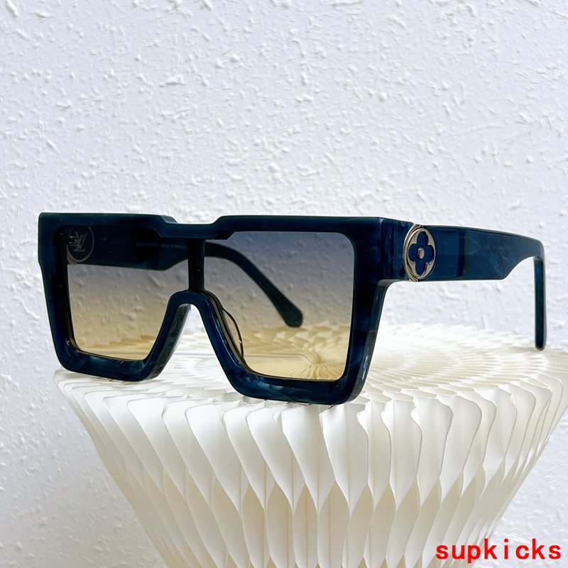 Close-up detail view of Louis Vuitton unisex sunglasses