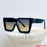 Close-up detail view of Louis Vuitton unisex sunglasses