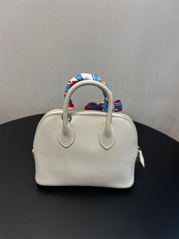  Minimalist top-handle bag carried on shoulder 10