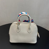  Minimalist top-handle bag carried on shoulder 10