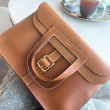  Minimalist handbag carried on shoulder